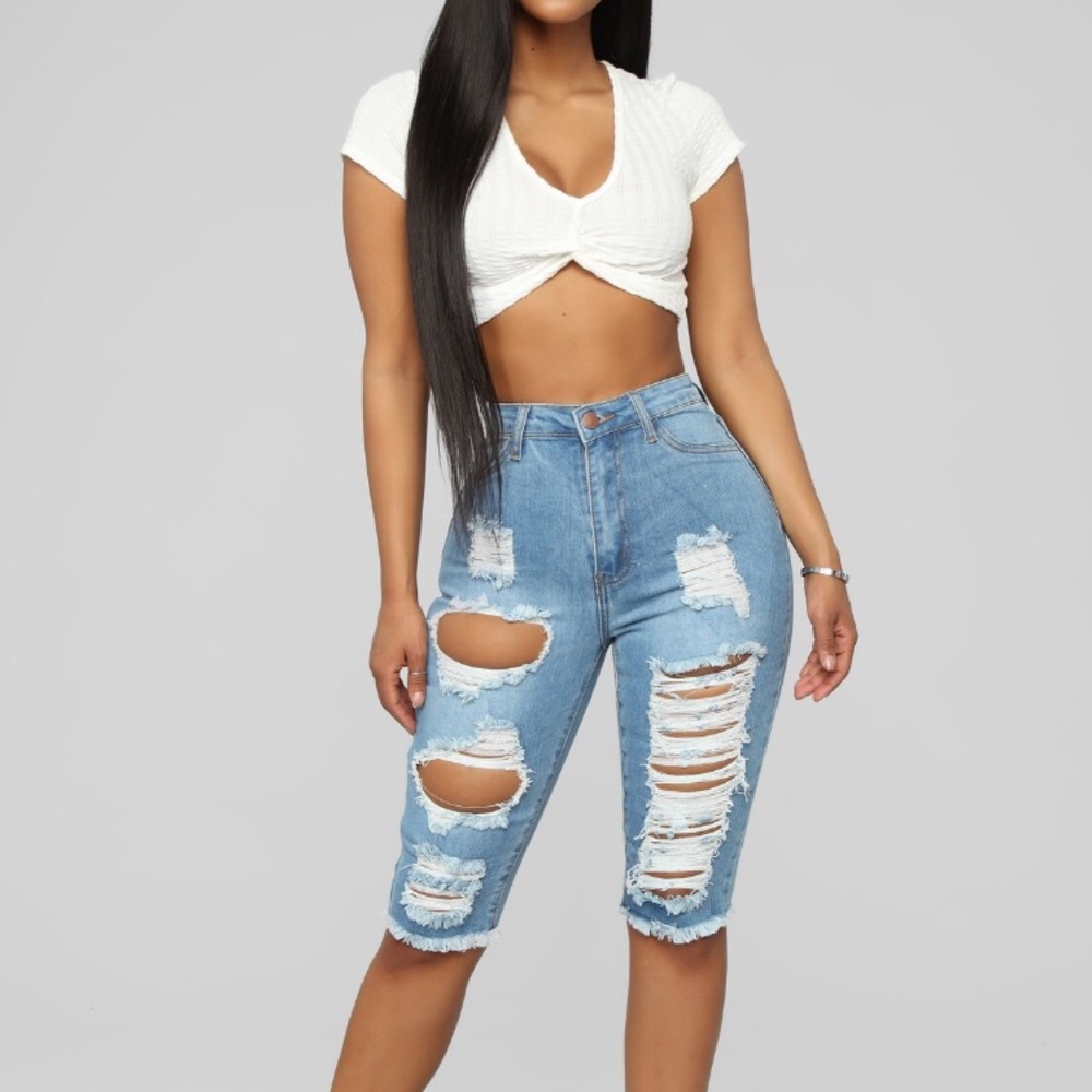 Distressed light blue shorts